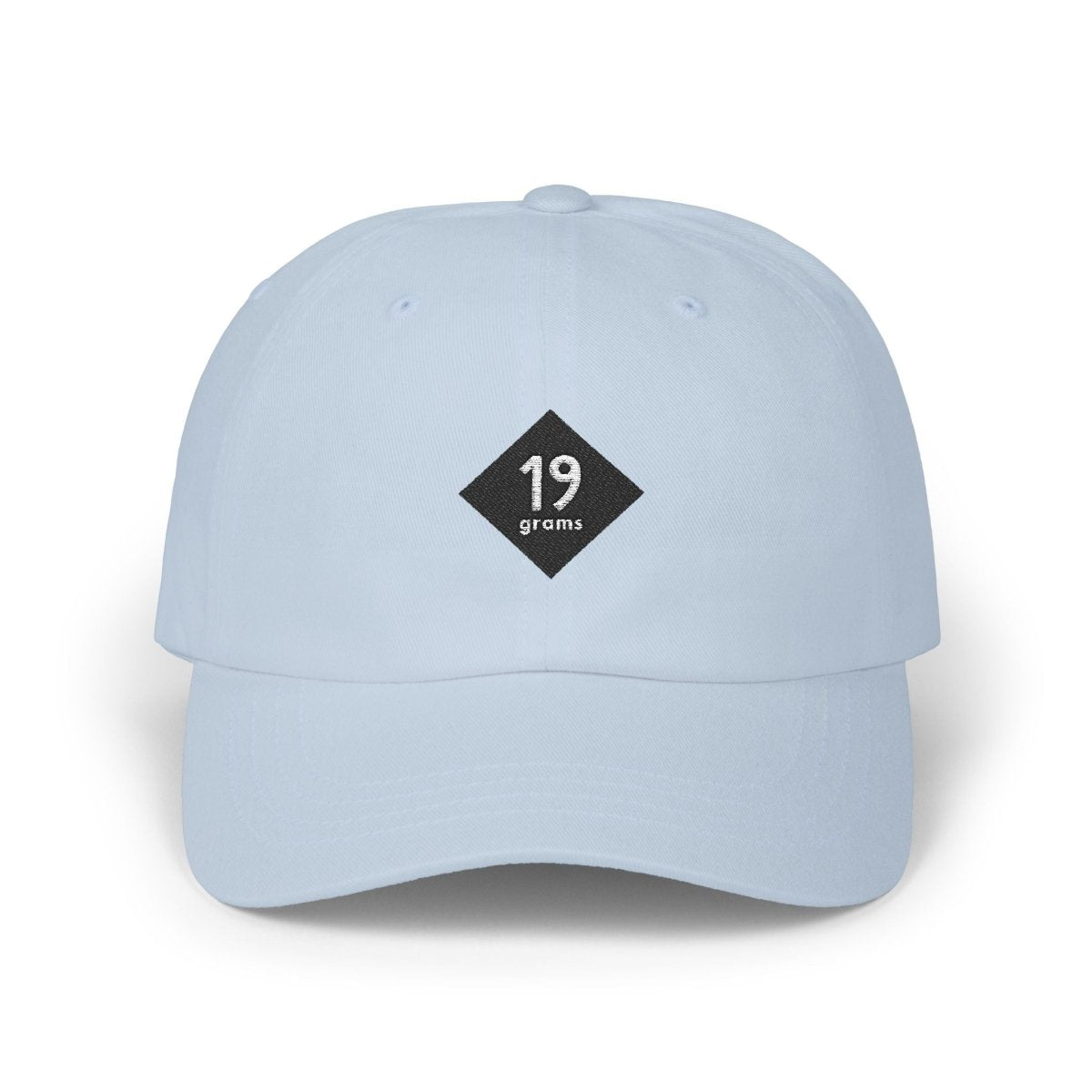 19grams Blaue Baseball Cap Frontansicht – Cap mit 19grims.com Roasters Logo, getragen von einer Person
