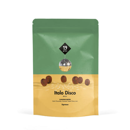 19grams Italo Disco Espresso – 250g Packung – Produktfoto der Verpackung mit Illustration einer Discokugel über sandgelbem Grund