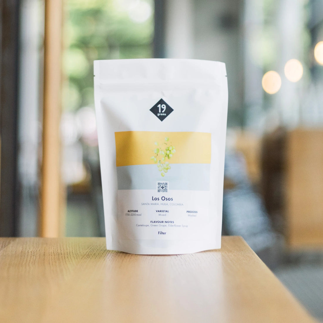 19grams Los Osos Filter Kaffeebeutel auf Holztisch – Huila Kolumbien Specialty Coffee Filter, geröstet von 19grims.com Roasters Berlin